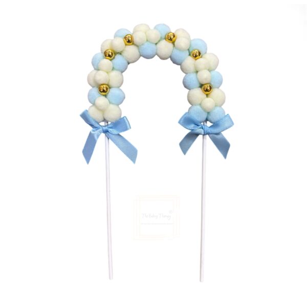 blue-pom-pom-arch-with-gold-beads cake-topper